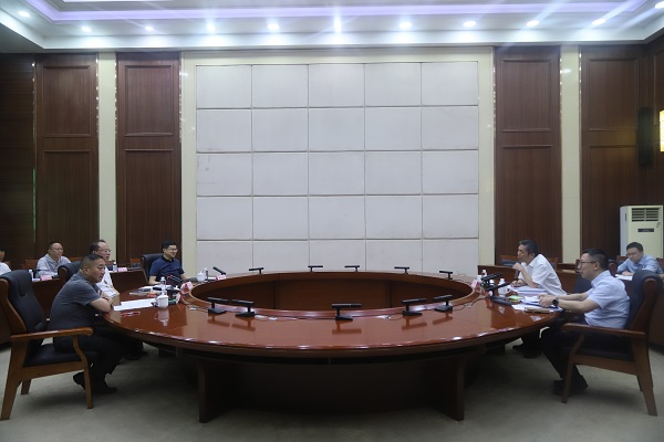 9.3范立新魏兴贵会见国开行重庆市分行行长刘喜荣一行(湛伟).jpg